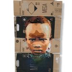 «Carton box: Modibo» by Akore – stencil on upcycled carton box, on show at Artevistas Gallery
